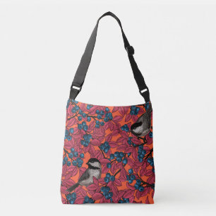 Chickadee birds on blueberry branches on orange crossbody bag