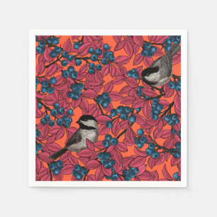 Chickadee birds on blueberry branches on orange napkins