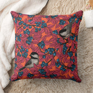 Chickadee birds on blueberry branches on orange throw pillow