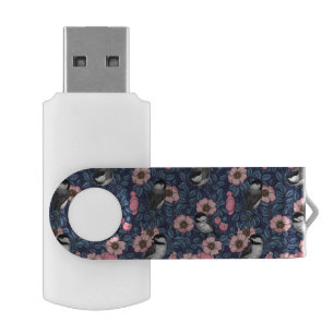 Chickadees in the wild rose in pink and blue flash drive