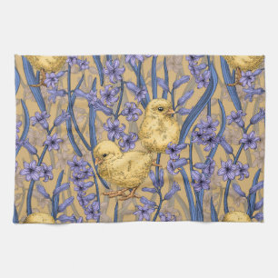 Chickens and hyacinths on yellow kitchen towel