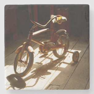 Child bicycle at the former grist mill stone coaster