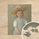 Child in a Straw Hat | Mary Cassatt Jigsaw Puzzle<br><div class="desc">Child in a Straw Hat (1886) by American impressionist artist Mary Cassatt. Original artwork is an oil painting on canvas depicting a portrait of a young girl in an oversized straw hat, wearing a plain gray pinafore. The serious expression on the girl's face sets this painting apart from Cassatt's other...</div>