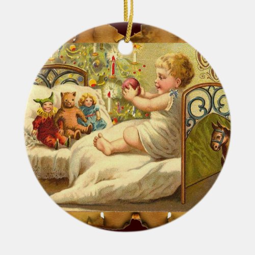 CHILD ON THE BED WITH TOYS AND CHRISTMAS GIFTS CERAMIC ORNAMENT