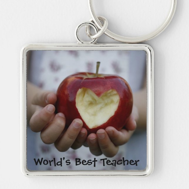 Child with apple heart keychain (Front)
