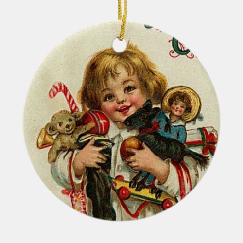 CHILD WITH TOYS AND CHRISTMAS GIFTS CERAMIC ORNAMENT