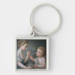 Children blowing bubbles keychain