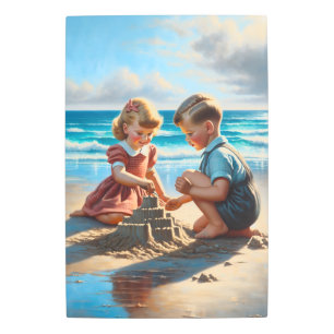 Children Building a Sandcastle on the Beach Metal Print