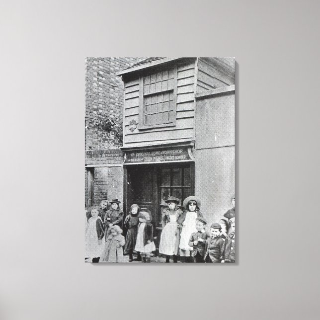 Children outside John Pounds's workshop Canvas Print (Front)