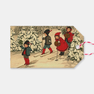 Children skiing, a vintage winter scene gift tags