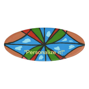 Child's windmill with red and green blades name tag