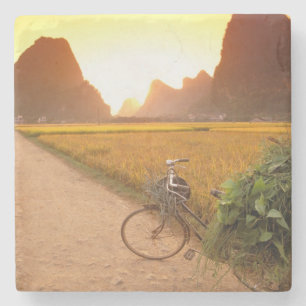 China, Guangxi. Yangzhou, Bicycle on country Stone Coaster