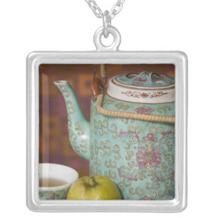 China, Hong Kong. Traditional Chinese teapot & 2 Silver Plated Necklace
