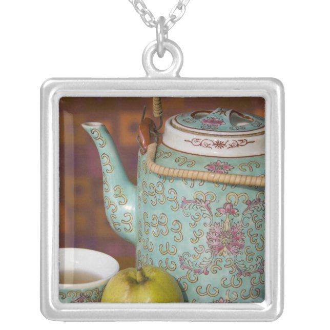 China, Hong Kong. Traditional Chinese teapot & 2 Silver Plated Necklace (Front)