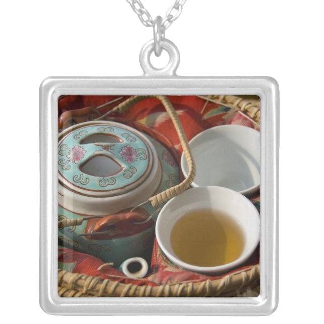 China, Hong Kong. Traditional Chinese teapot & 3 Silver Plated Necklace (Front)