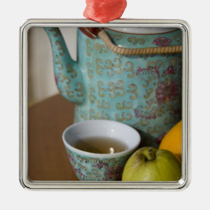 China, Hong Kong. Traditional Chinese teapot & Metal Ornament