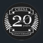 China Traditional wedding anniversary 20 years Large Clock<br><div class="desc">A design to celebrate 20 years of marriage. This design has a white (china) colored laurel design on a black background. China is the traditional gift for this occasion. The text reads china 20 years anniversary. A romantic design to celebrate your 20th year of marriage. If you would like any...</div>