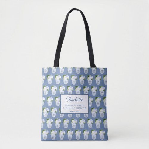 Chinoiserie Blue White Wedding Monogram Thank You Tote Bag - The background of this gift bag design is a watercolor ginger jar vase which is filled with blue and white flowers / green leaves, arranged into a repeating pattern. On one side is a thank you message relating to the wedding; on the other side is the initial of the recipient. The text shown is for a Maid Of Honor thank you bag but all of the text fields are customizable to your needs. 