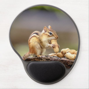 Chipmunk eating a peanut gel mouse pad