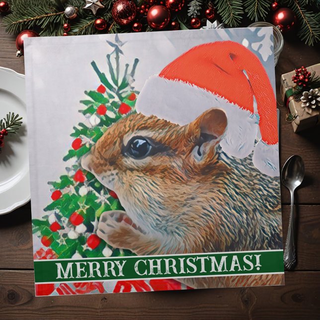Chipmunk with Christmas Hat in Front of Tree Cloth Napkin (This cute cloth Christmas napkin features a sweet Santa chipmunk you can enjoy for years to come.)