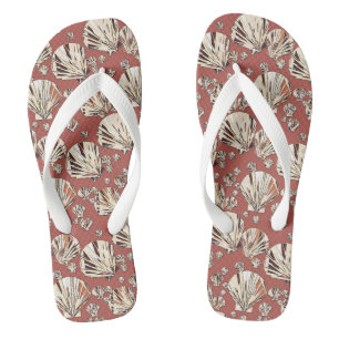 Chocolate and tan sea shells, chocolate background flip flops