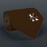 Chocolate Brown Elegant Monogram   Name One-Sided Neck Tie<br><div class="desc">An elegant one-sided necktie featuring a bold white monogram across a rich Chocolate background. On top of this monogram sits your first or last name spelled out in all capitals. If you prefer a bolder look for the personal name inside of the large letter you can do the following: Use...</div>