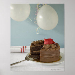 Chocolate cake with missing slice on table, poster