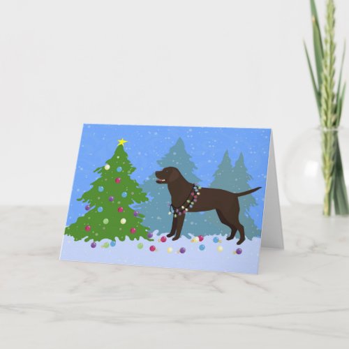 Chocolate Lab in Forest Decorating Christmas Tree Holiday Card