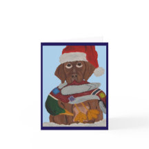 Chocolate Labrador Puppy in Santa Hat & duck toy