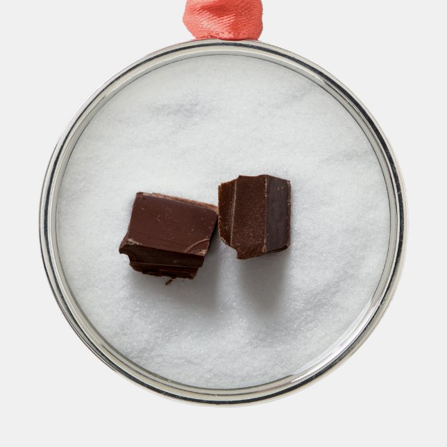 Chocolate with sugar as a background metal ornament (Front)