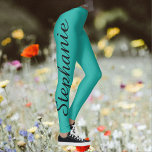 CHOOSE YOUR COLOR Custom Yoga Leggings with Name<br><div class="desc">CHOOSE YOUR COLOR custom yoga leggings! Printed edge to edge, with your name in large black script up one leg! Sample is turquoise blue green but you can easily customize to color of your choice. Also easy to change or delete example text. All Rights Reserved © 2016 Alan & Marcia...</div>