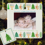 Chrismukkah Photo Personalized Holiday w/Year Ceramic Ornament<br><div class="desc">Happy Chrismukkah Christmas Hanukkah personalized Holiday ornament! Christmas Trees, Menorah's, and Dreidels adorn this photo personalized Holiday ornament. Add your family name and year. This elegant square holiday ornament design has a variety of watercolor pine trees, menorah's, and dreidels surrounding your photo. Happy Holidays greeting can be personalize with your...</div>