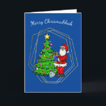 Chrismukkah Santa with Menorah Christmas Card<br><div class="desc">This Chrismukkah card features Santa Claus holding a menorah by a Christmas tree with a star and lights. So, your holiday can be bright from either a Christmas tree or from the candles on the Menorah. Well, that's my idea anyway. But, you're free to change the inside greeting to suit...</div>