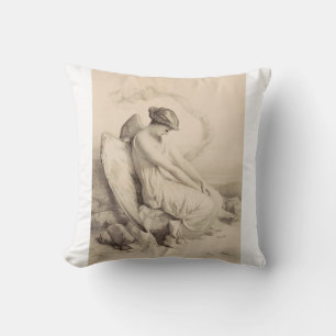 Christian angel sitting on a stone throw pillow