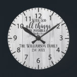 Christian Gift Rustic Wood Scripture Family Name Round Clock<br><div class="desc">Modern rustic farmhouse style light gray wood background with inspirational scripture from Matthew "With God all things are possible" with the customizable family name and established date.</div>