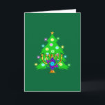 Christmas and Hanukkah Together Holiday Card<br><div class="desc">Christmas and Hanukkah on gifts for interfaith families that celebrate the joy of Christmas and beauty of Chanukah.  Featuring Xmas tree and menorah with jewish star of david surrounded by holiday presents on greeting cards,  postage,  gift ideas and apparel for the family.</div>