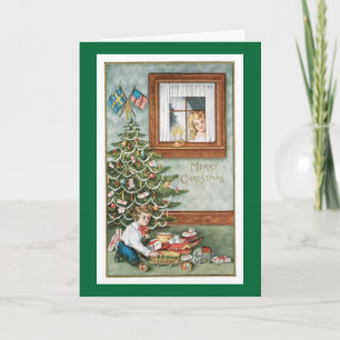 Christmas Angel watching over boy with toys Holiday Card