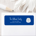Christmas Beach Sand Dollar Blue Return Address Label<br><div class="desc">Christmas Beach Blue Return Address Label,  with a tropical sand dollar and white typography design. With customizable lettering,  you can add your own text. A festive addition to your holiday invitations and cards.</div>
