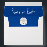 Christmas Beach Sand Dollar Peace on Earth  Envelope<br><div class="desc">Christmas Beach Blue Peace on Earth Holiday envelope,  with a sand dollar and a typography design. With customizable lettering,  you can add your own text. A simple way to add a touch of the ocean to your holiday gifts and cards.</div>