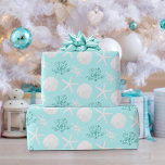 Christmas Beach Sand Dollar Starfish Aqua Blue  Wrapping Paper<br><div class="desc">This beautiful beach themed coastal Christmas wrapping paper features a pattern of starfish,  sand dollars,  and aqua glitter coral on a light aqua blue background.
Please visit the collection for many matching products. If you would like even more matching products,  or other colorways,  please contact me through Zazzle Chat.</div>