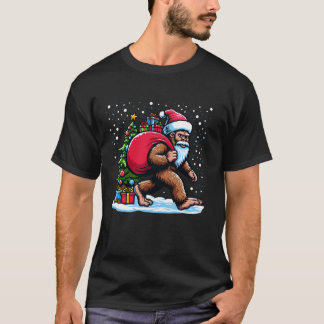 Christmas Bigfoot Santa Claus Carrying Gifts Festi T-Shirt