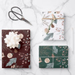 Christmas Boho Winter Greenery Wrapping Paper Sheets<br><div class="desc">This Christmas gift wrapping paper features an elegant boho winter greenery pattern appearing in soft tans and teals. The wrapping sheets come in the set of 3,  each with a different colored background: white,  dark burgundy,  and dark teal green.</div>