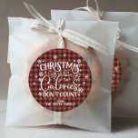 Christmas Calories Don't Count Classic Round Sticker<br><div class="desc">Add some humor to your holiday treats with this “Christmas Calories Don’t Count” sticker,  set against a rustic red and black buffalo plaid background with playful snowflakes. Perfect for cookie bags,  home made goodies or holiday party favors.</div>