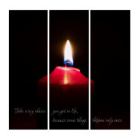 Christmas candle light in dark night in Advent Tri