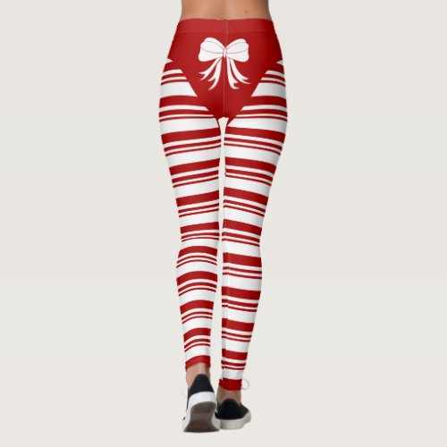 Christmas Candy Cane Leggings - Festive holiday candy cane white ribbon and red stripes leggings.