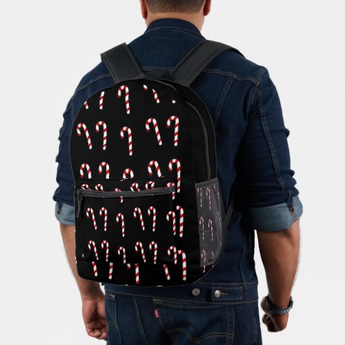Christmas candy cane on black printed backpack