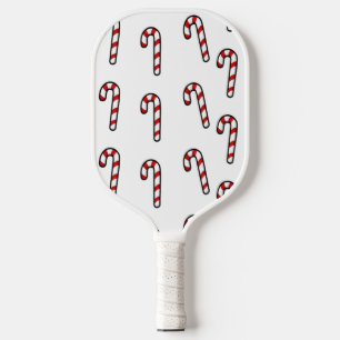 Christmas candy cane on white pickleball paddle