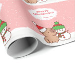 Christmas Capybara And Snowman Cute Wrapping Paper<br><div class="desc">Give your gifts a festive touch with our Christmas Capybara and Snowman Cute Wrapping Paper. Featuring a lovable design of Capybara in Santa hat and Snowman in winter costume frolicking on a white and pink snow background. Customize it with your preferred name, family name, or business name to add a...</div>