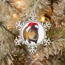 Christmas Capybara In Winter Background