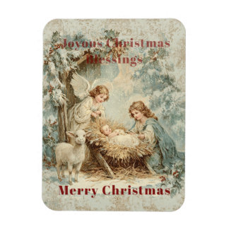 Christmas card with baby Jesus in a manger and ang Magnet